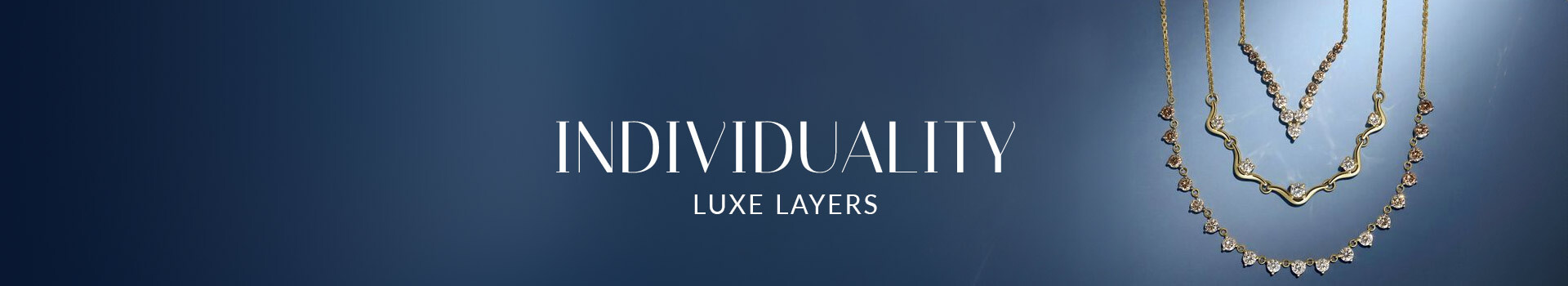 Layered Le Vian® necklaces with graduated diamond accents displayed against a deep blue background.