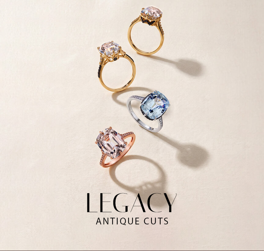 Le Vian® antique gemstone cut rings in gold, rose gold and white gold on a cream background.