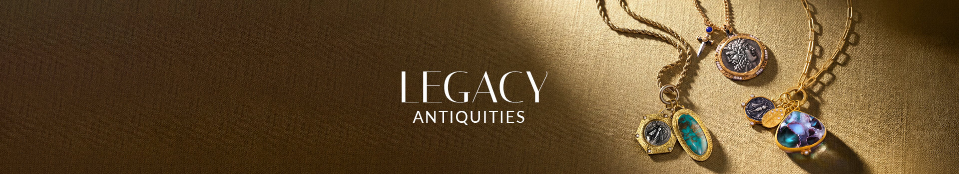 Le Vian® antiquity-inspired charm necklaces featuring coin, dagger, turquoise and colorful gemstone pendants on gold fabric.