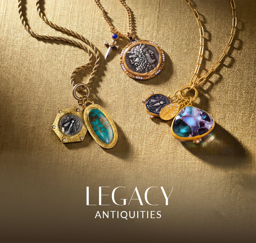 Le Vian® antiquity-inspired charm necklaces featuring coin, dagger, turquoise and colorful gemstone pendants on gold fabric.